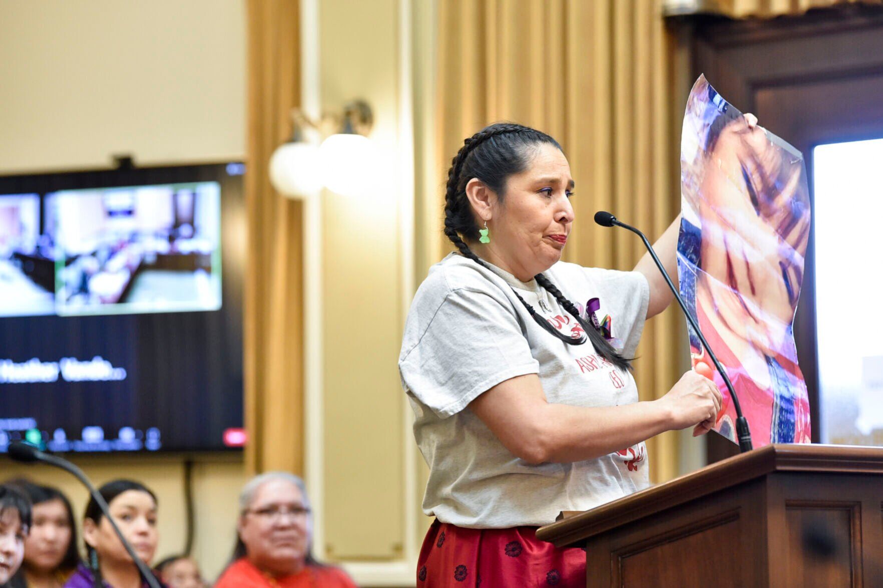 Diana Burd holds a photo of Arden Pepion